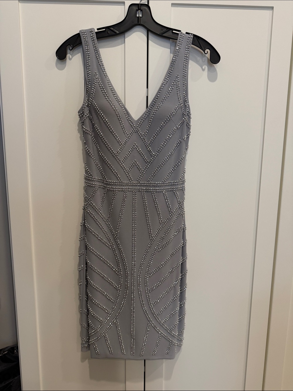 NWT Avery G Gray mini dress with beading. Size 0. Built in cups. Brand New!